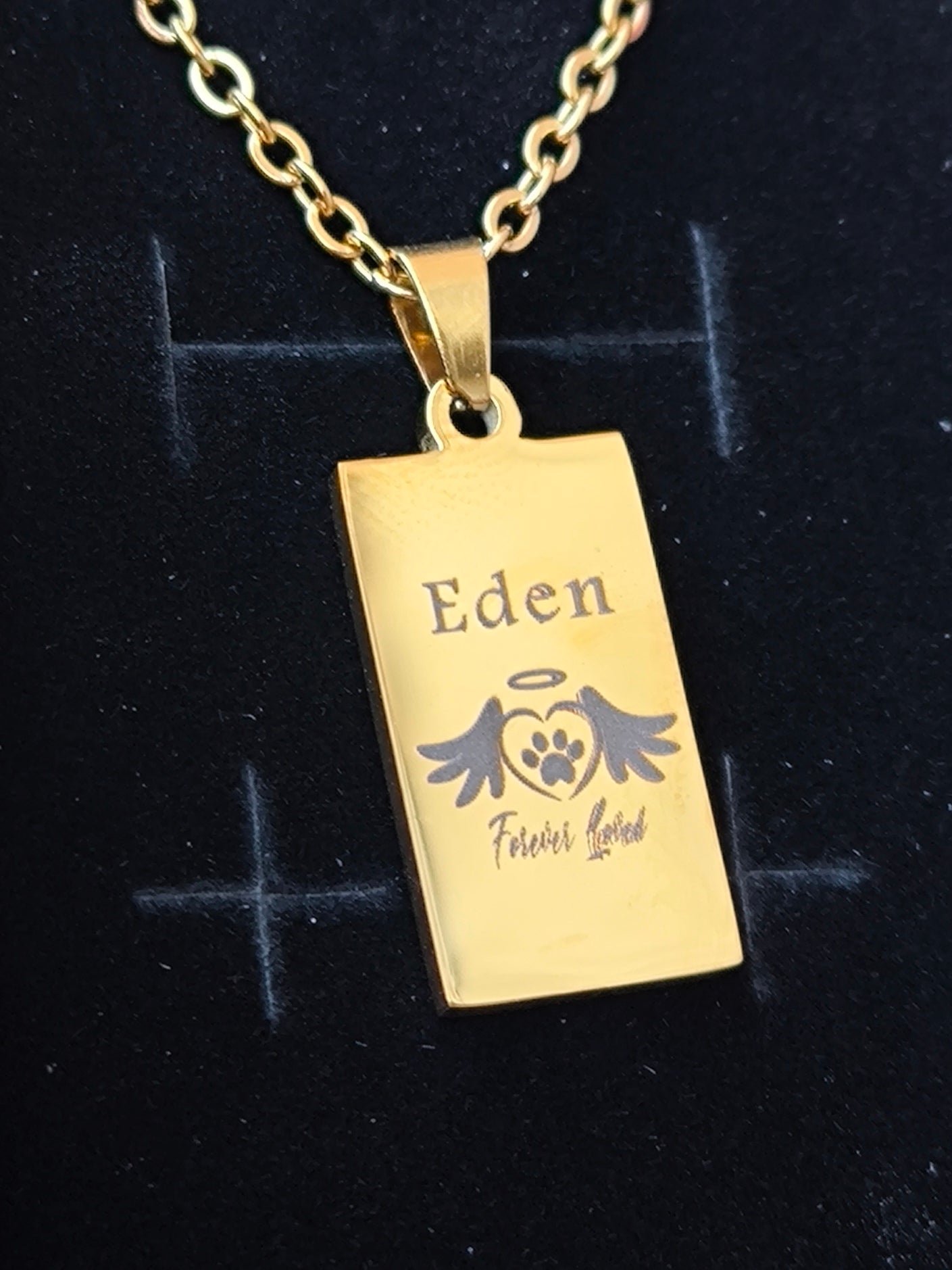 le pendentif lingot patte chien avec ailles